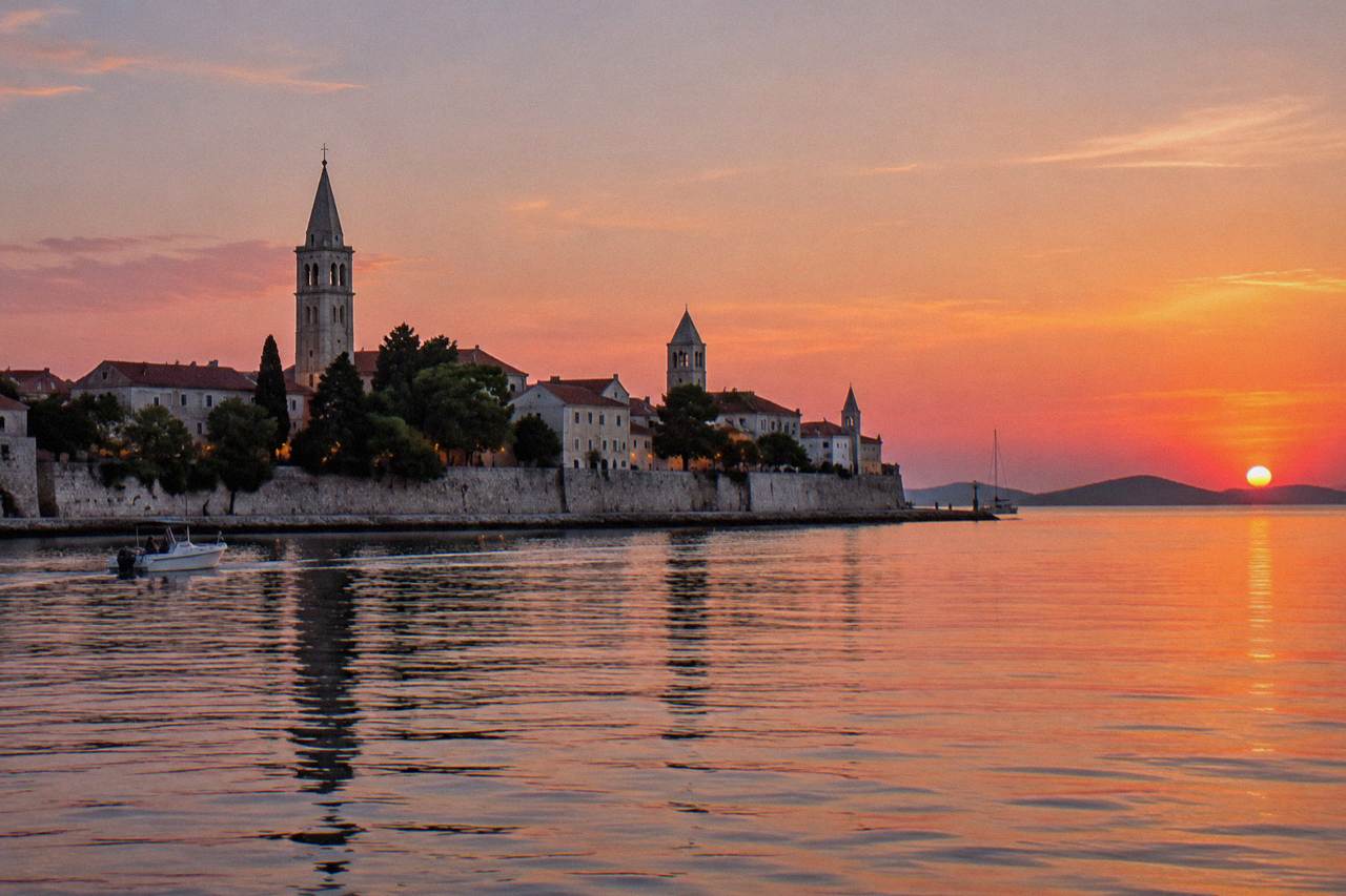 Zadar's old town peninsula from the water on a calm Adriatic evening