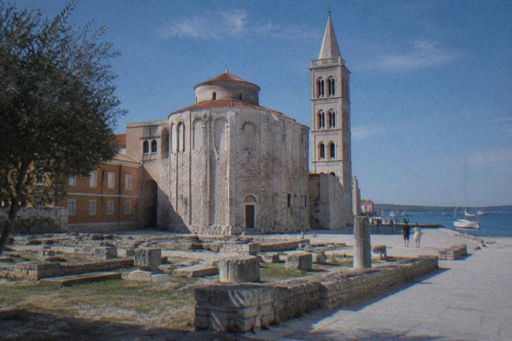 The round Church of St Donatus seen across ancient Roman stones in Zadar