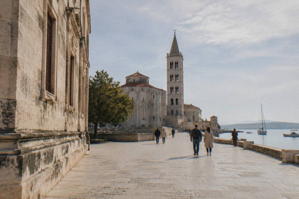 Old Town square near the museum with a bell tower beyond