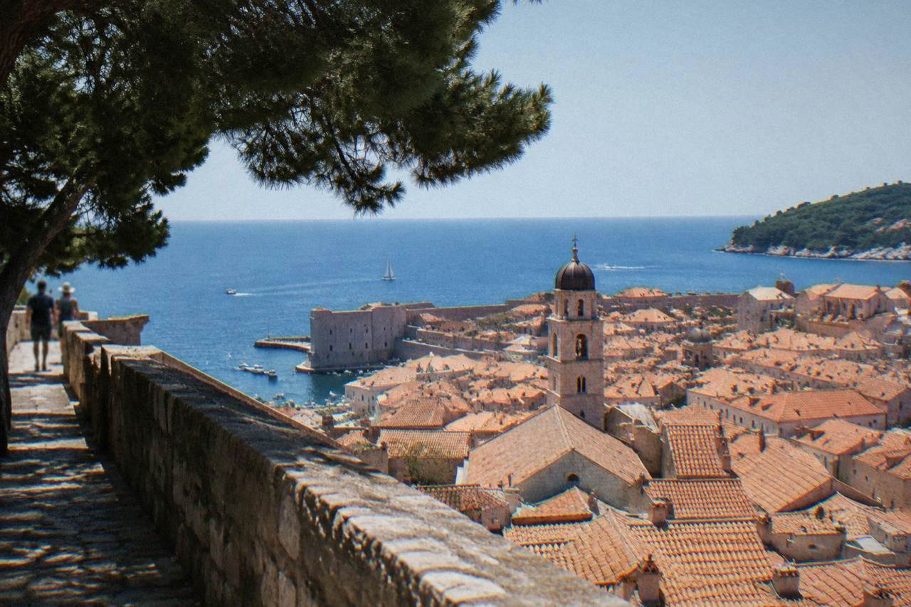 Dubrovnik terracotta roofs and bell tower seen from the high city walls