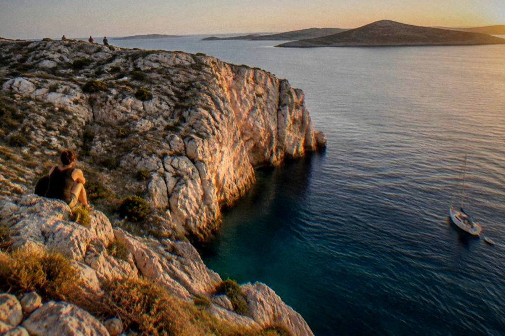 Pale limestone cliff dropping to turquoise water on a Kornati island