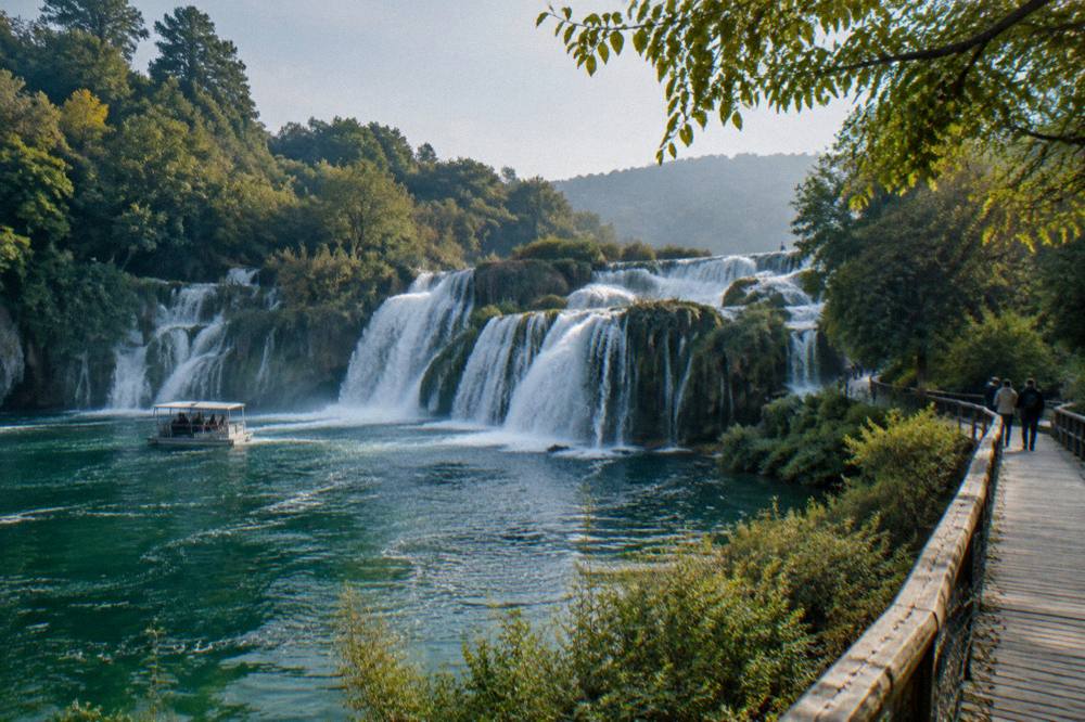 Brimming cascades and few visitors on the boardwalk in shoulder season