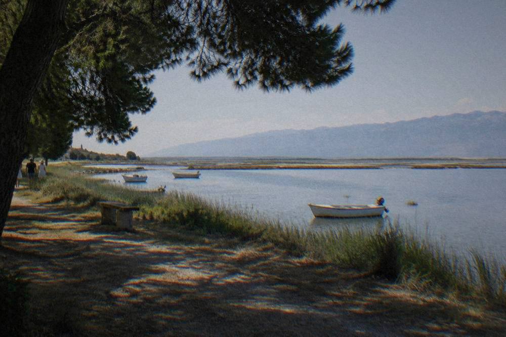 Nin lagoon and salt pans with distant mountains on the horizon