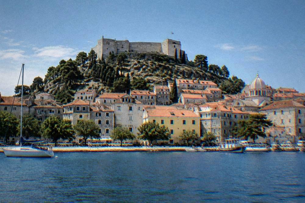 Stone fortress on a hill above Sibenik and terracotta roofs