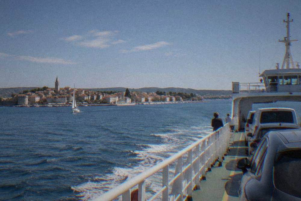 Small ferry crossing the channel from Zadar to Ugljan on a clear day