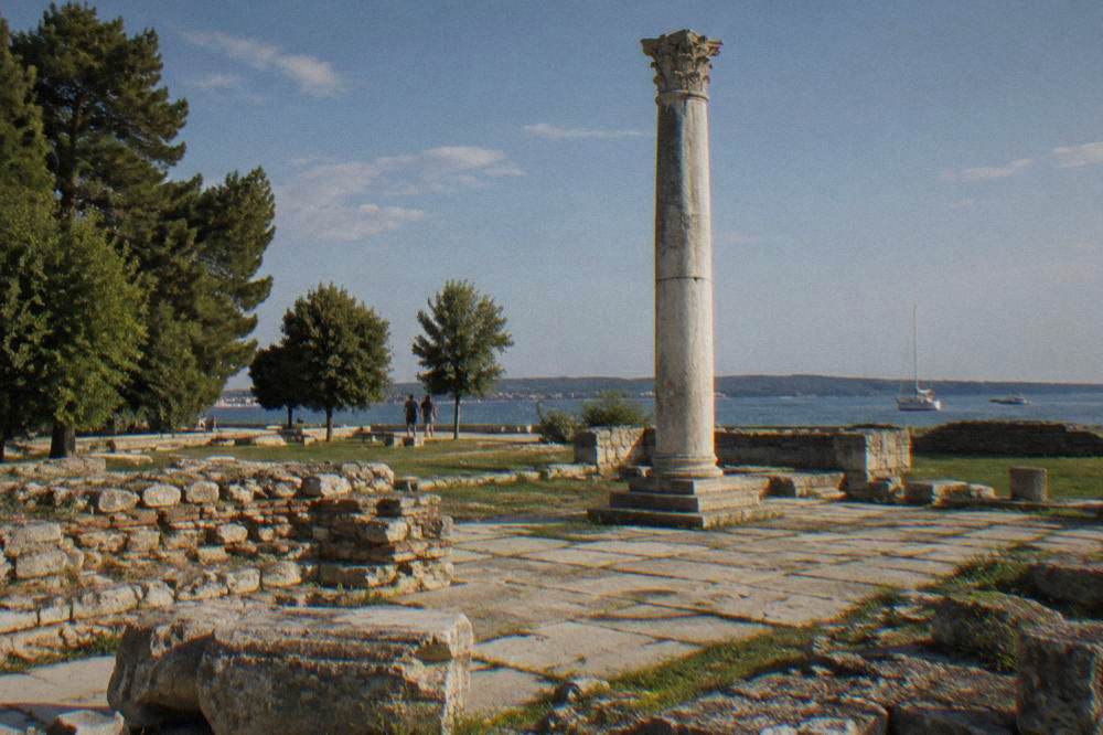 Roman Forum column and paving stones in an open square in Zadar.