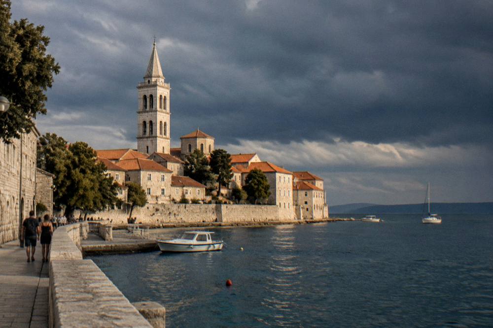 Storm clouds gathering over the Adriatic behind the terracotta roofs of Zadar old town.