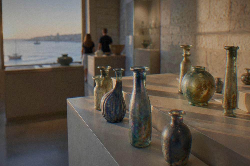Small ancient glass bottles with blue-green patina on pale display shelves, softly lit.
