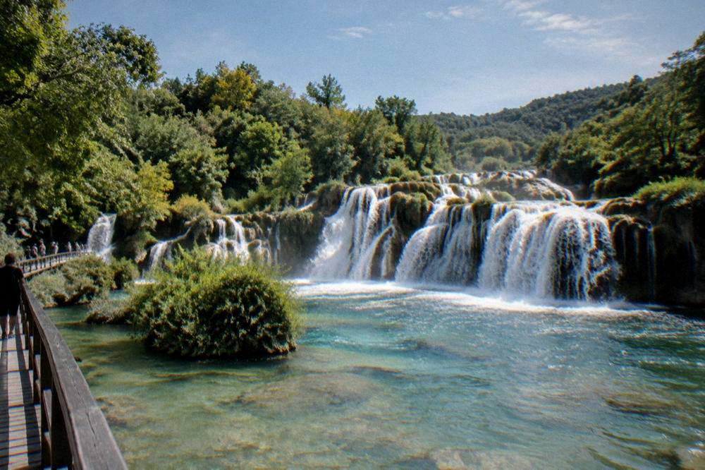 Water cascading over travertine terraces at Skradinski Buk waterfalls in Krka National Park.