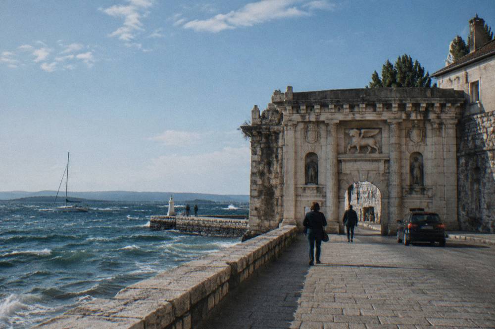 Whitecaps on the Adriatic beyond the Sea Gate on a windy day in Zadar.