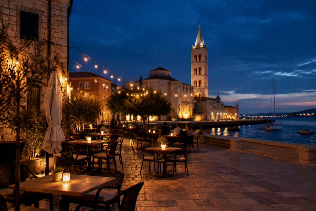 A terrace with string lights in a Zadar old town square at night