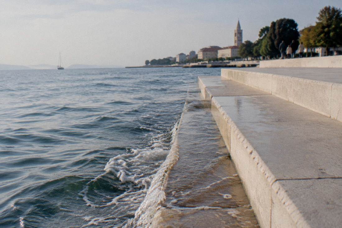Wave-washed stone steps of the Sea Organ in the morning